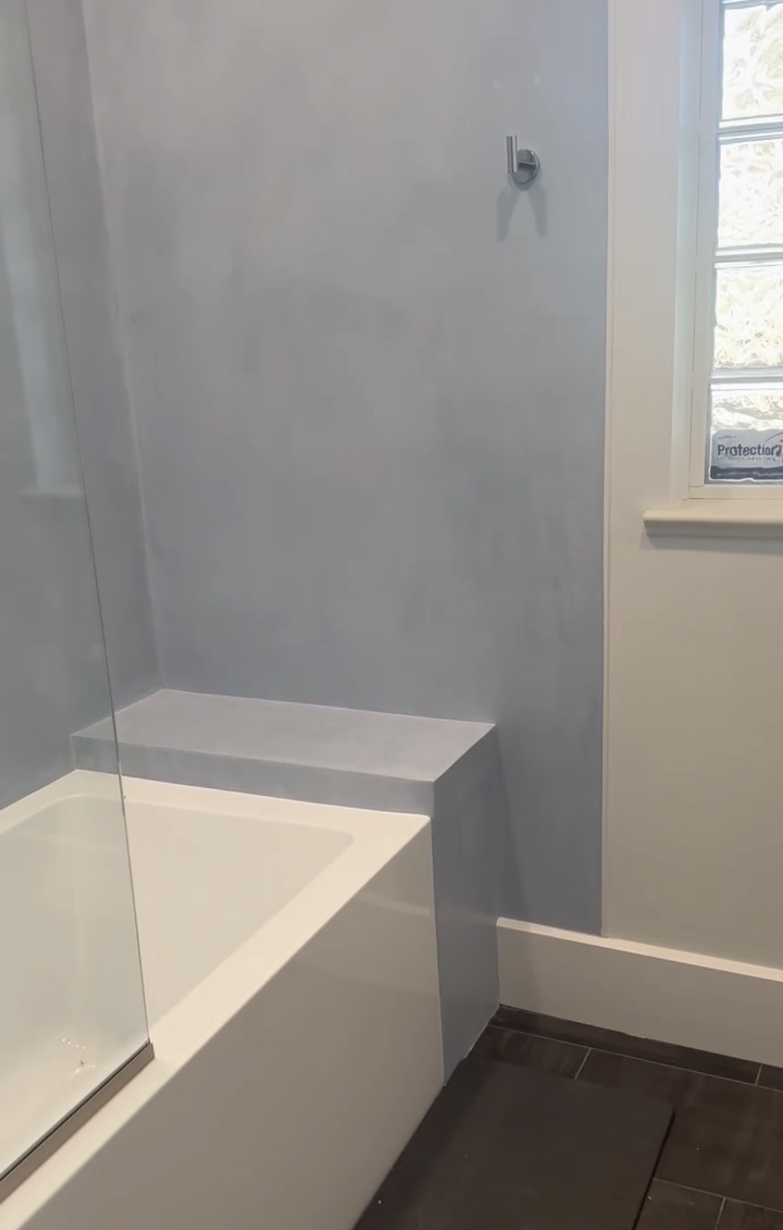 Finished tadelakt waterproof plaster shower with built-in bench, Stuart FL