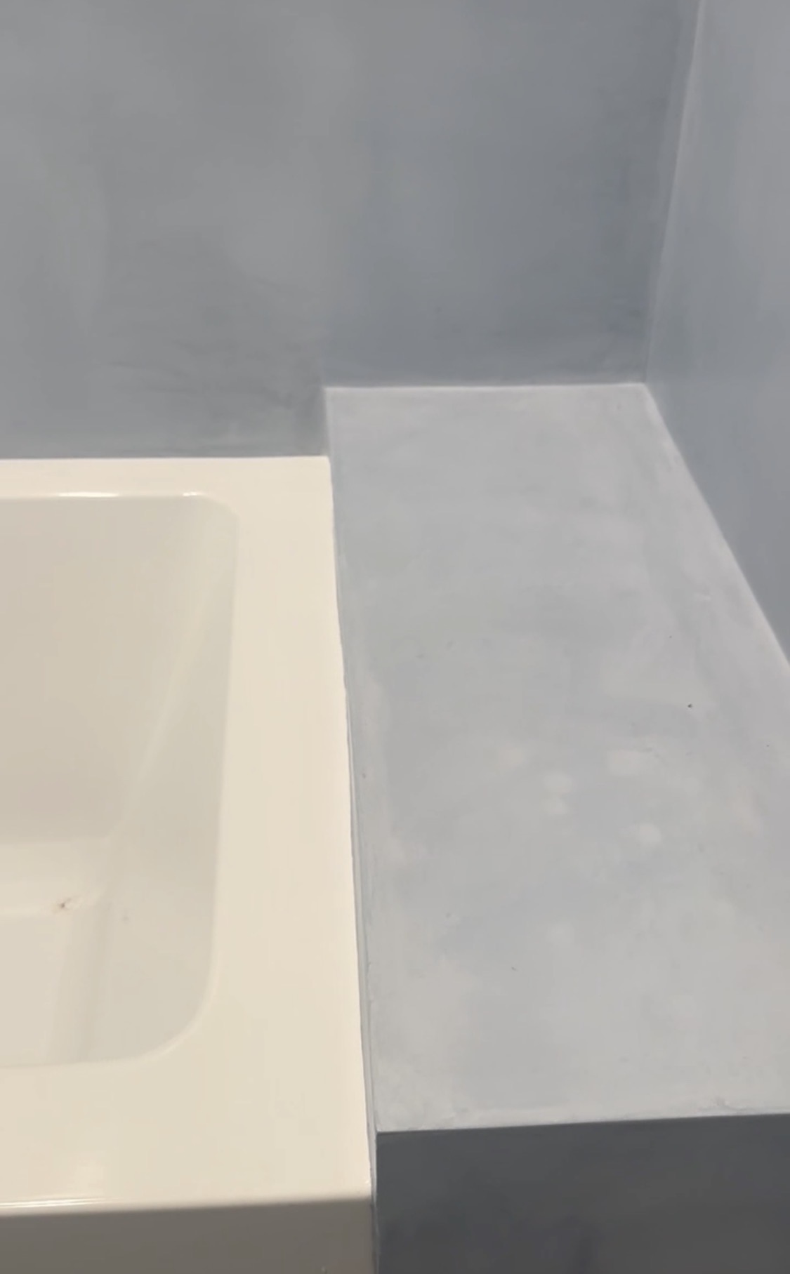 Waterproof tadelakt plaster shower bench and tub surround, Stuart Florida
